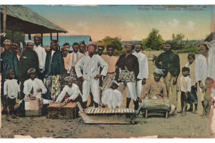 <strong>Malay dance troupe in costume and posing with their musical instruments in Singapore</strong>